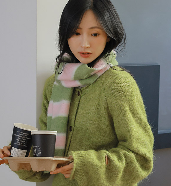 Rolly Wool Dangara Knit Muffler